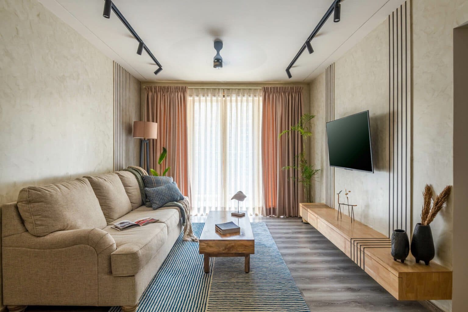 Concepto Studio designs a chic 2.5-BHK apartment in Bangalore for a young couple, maximizing space with clever use of color scheme and wall textures — interior design by Concepto Studio in Bangalore