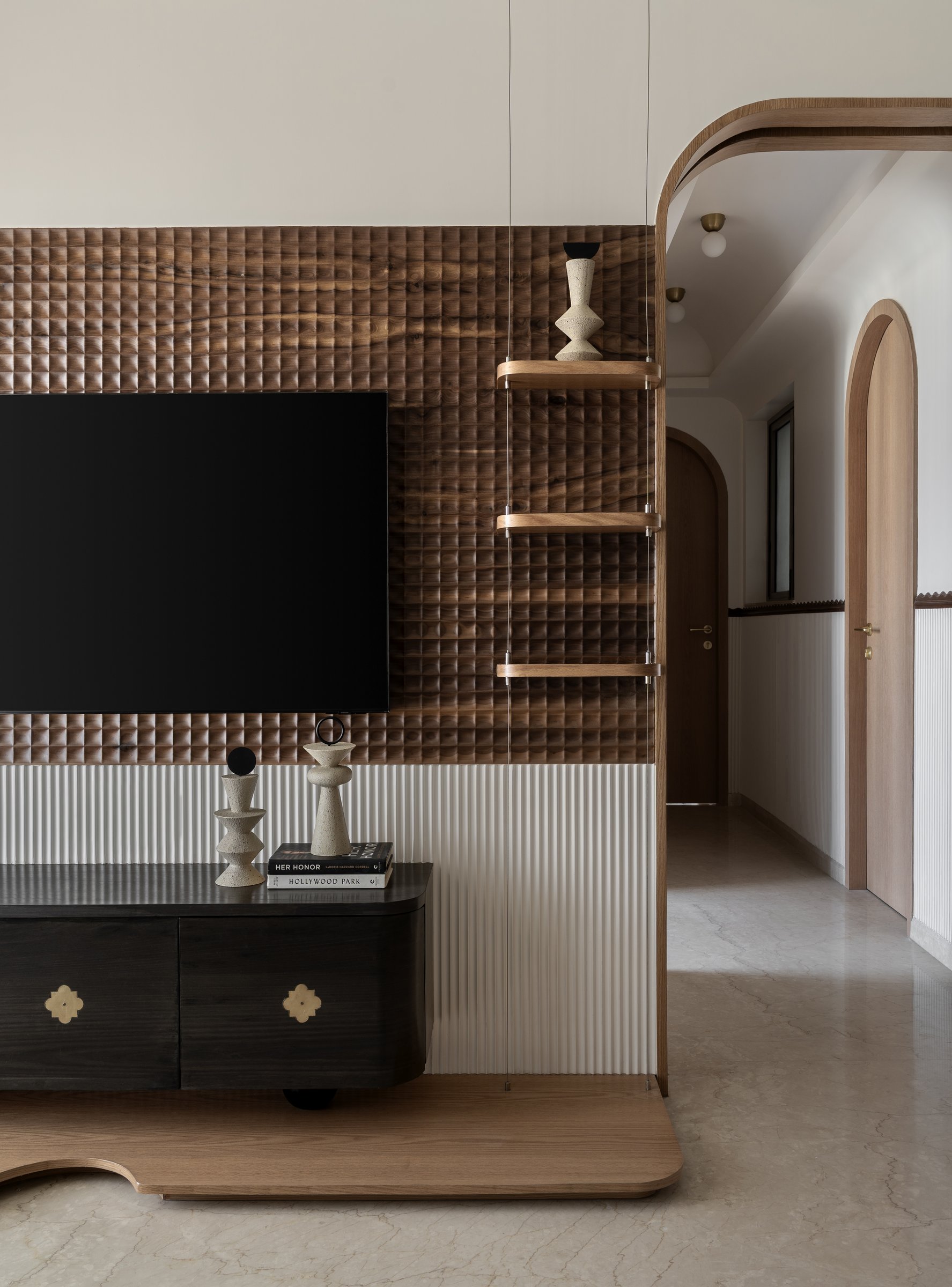 Seen obliquely, the media wall reveals itself as a freestanding screen, organising the plan as well as the elevation