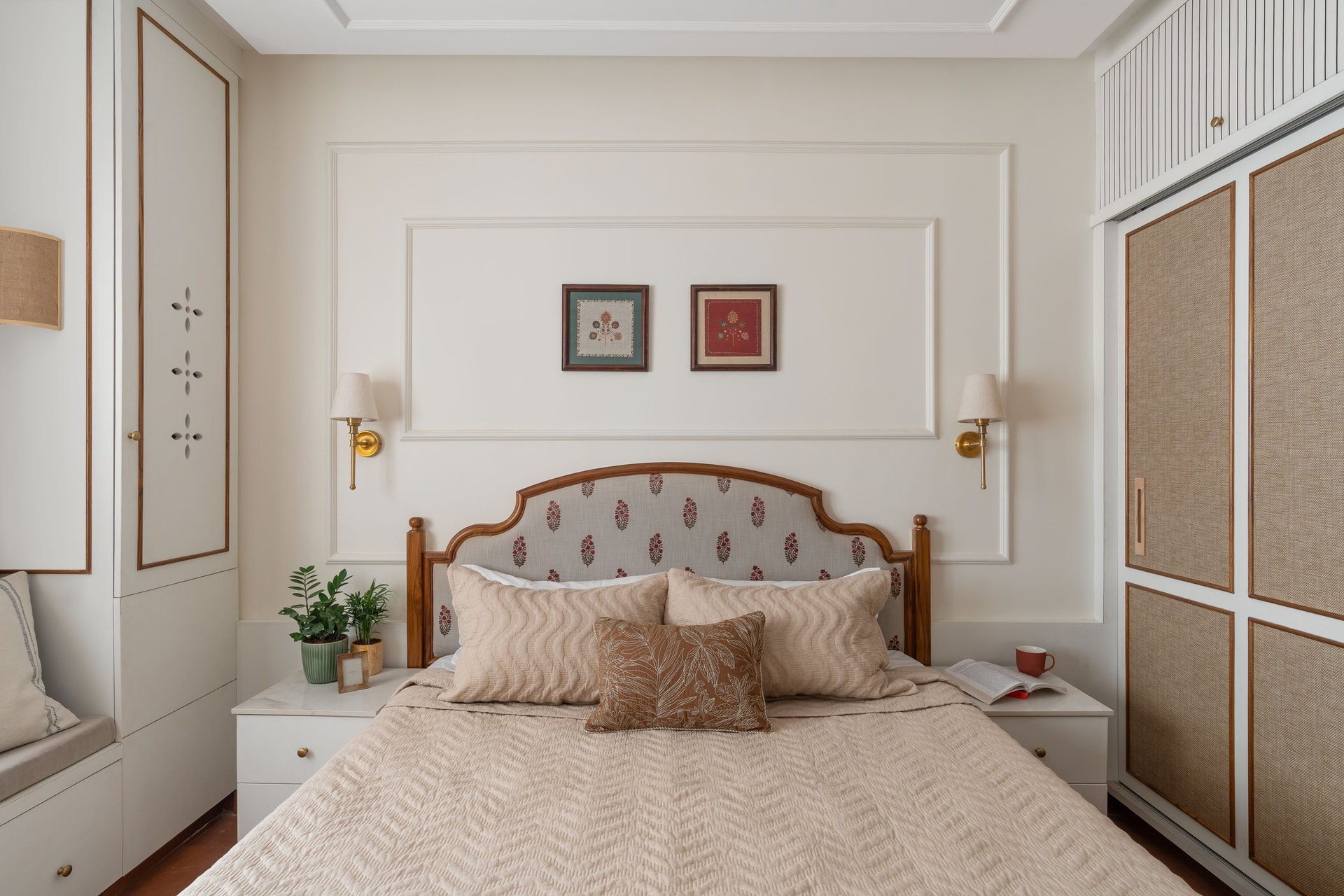The parents' bedroom, where a fabric headboard in a block-floral print signals deliberate traditionalism