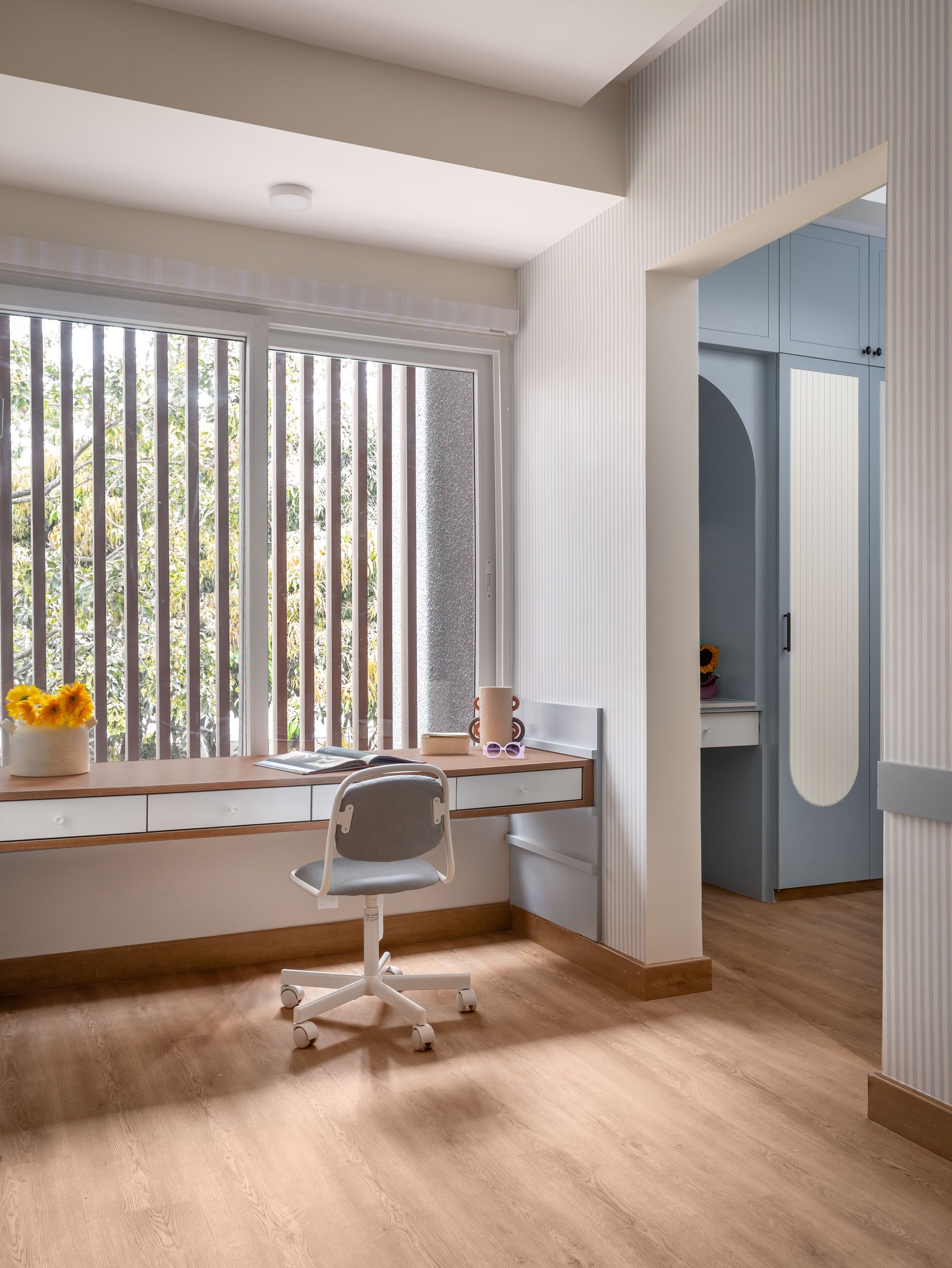 The study nook, holding the bunk room's colour story at a quieter pitch