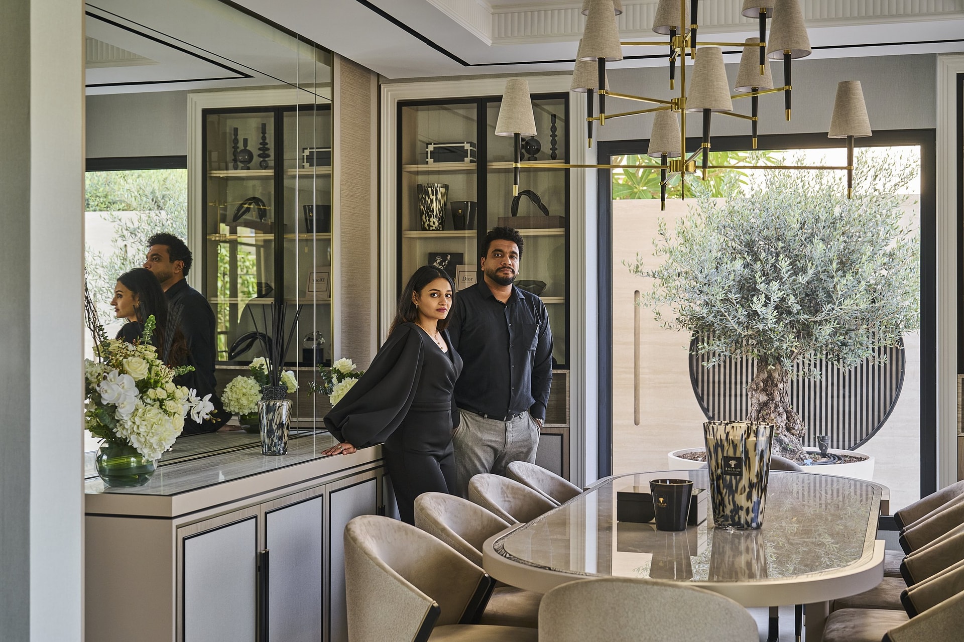 Sally Negm and Ahmed El Morshedy of Peristylia, photographed in the dining room they composed around the family's heritage