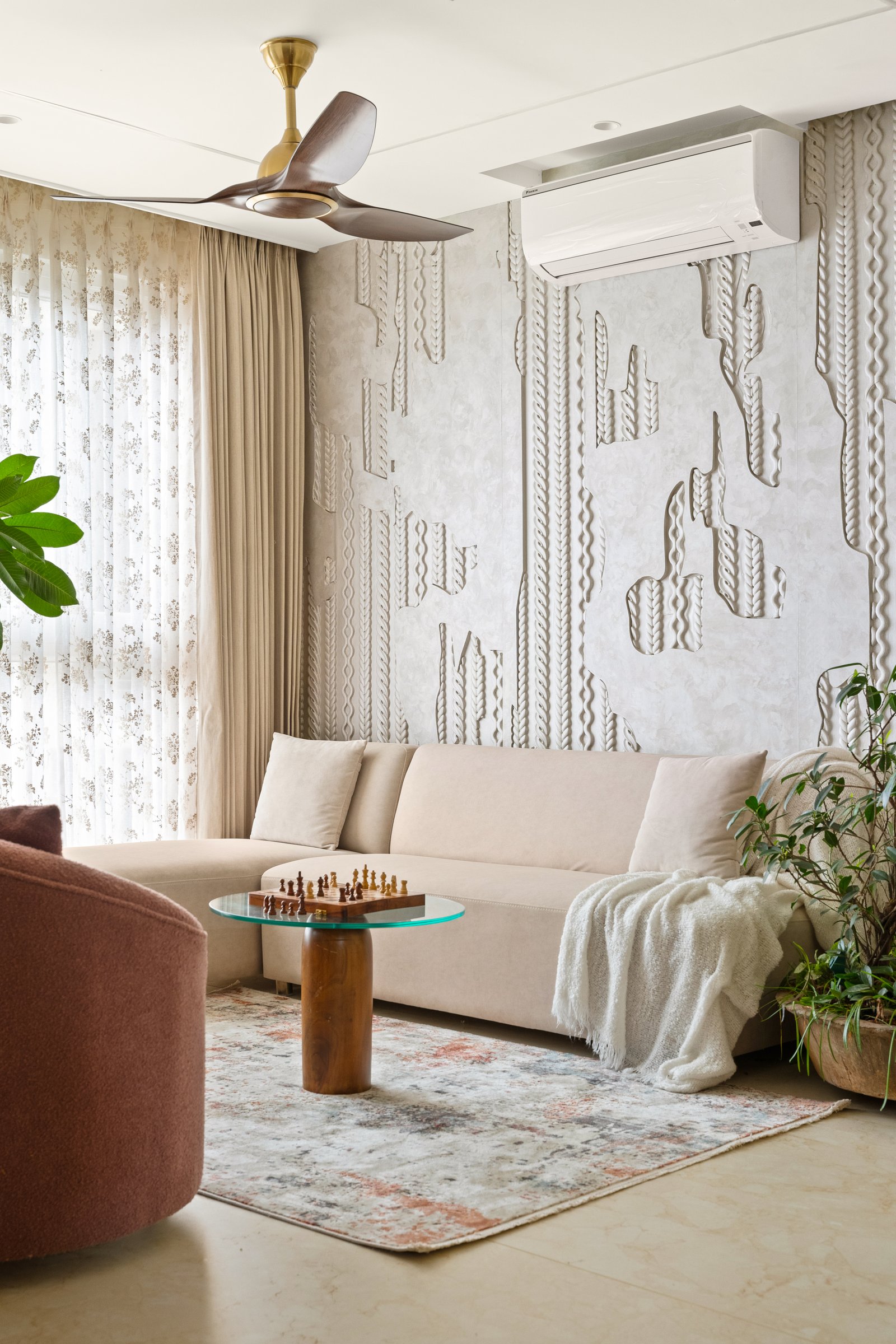 The textured plaster panel reads as cable-knit at one angle and rope at another, depending on how the light falls