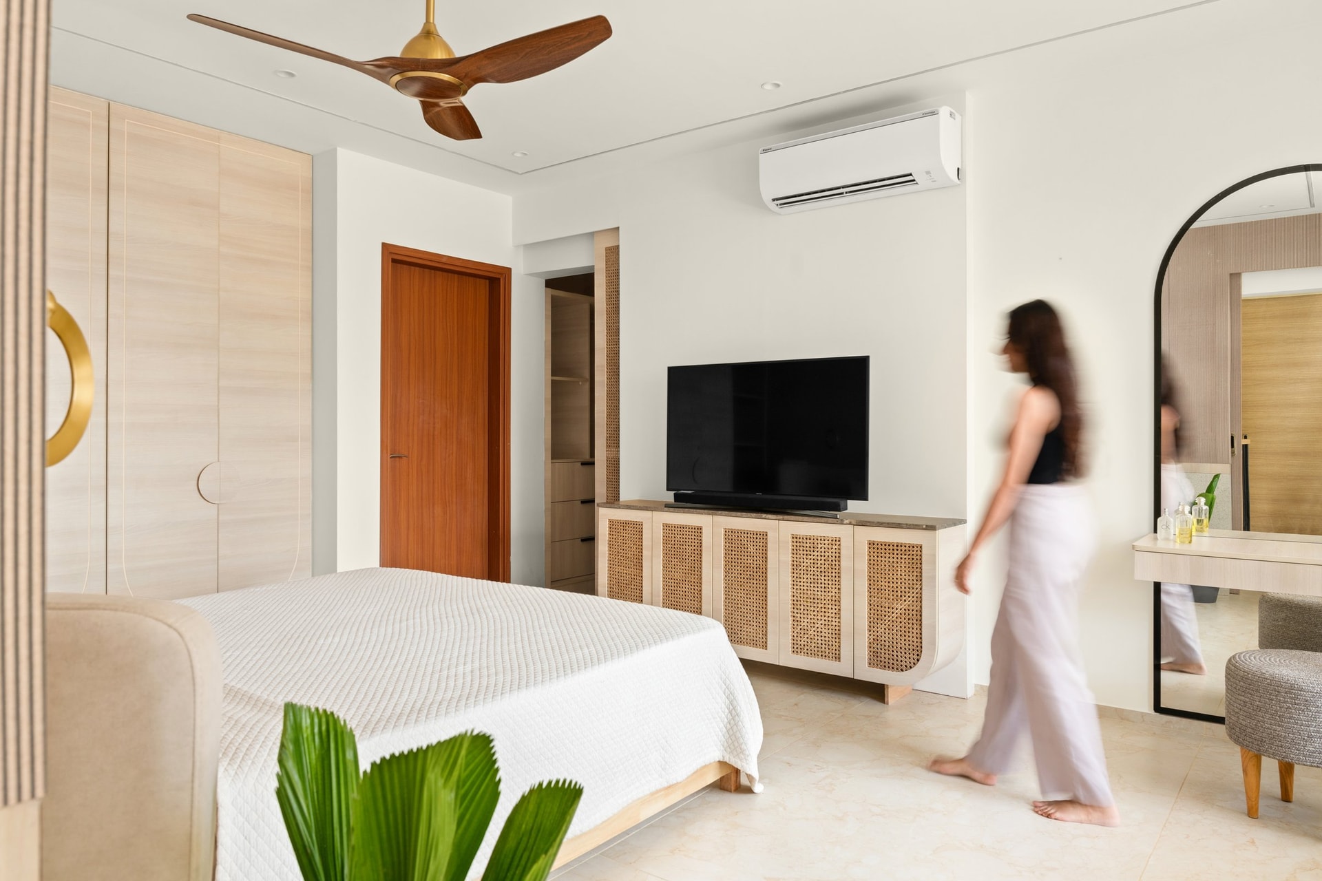 Three quiet movements: fluted timber, teak, and cane-fronted storage