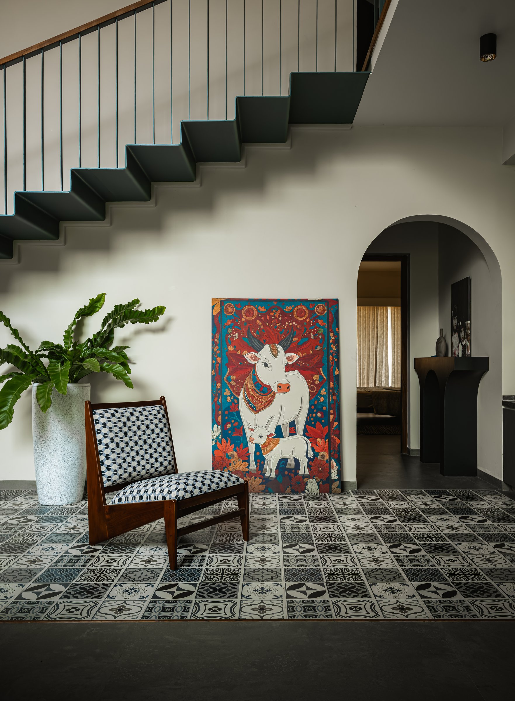 The foyer, where a leaning Pichwai-inspired canvas sets the tone for a home that lives with its art rather than enshrines it