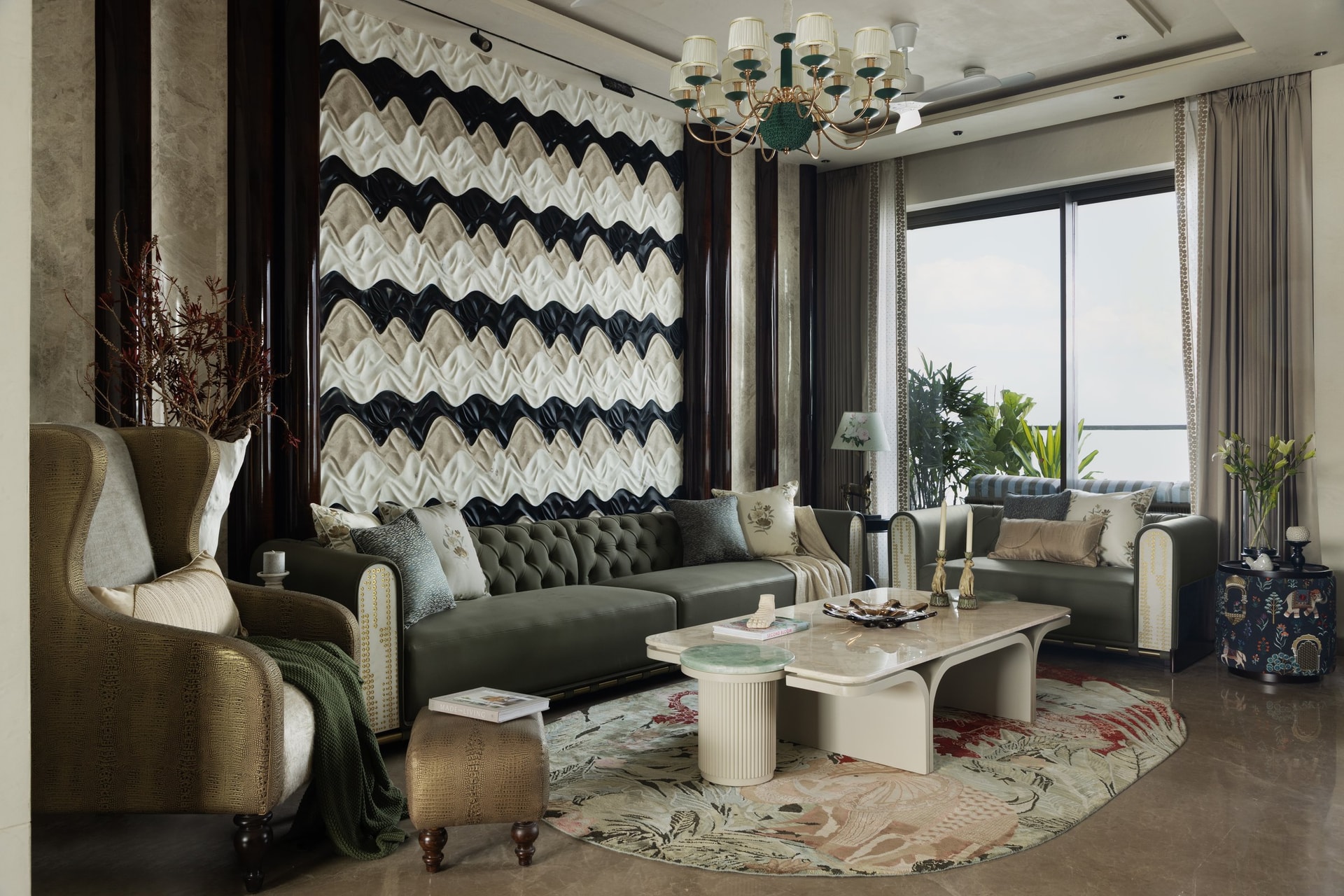 The tufted chesterfield and gilded stud detailing read the ornament of the feature wall as something structural rather than applied