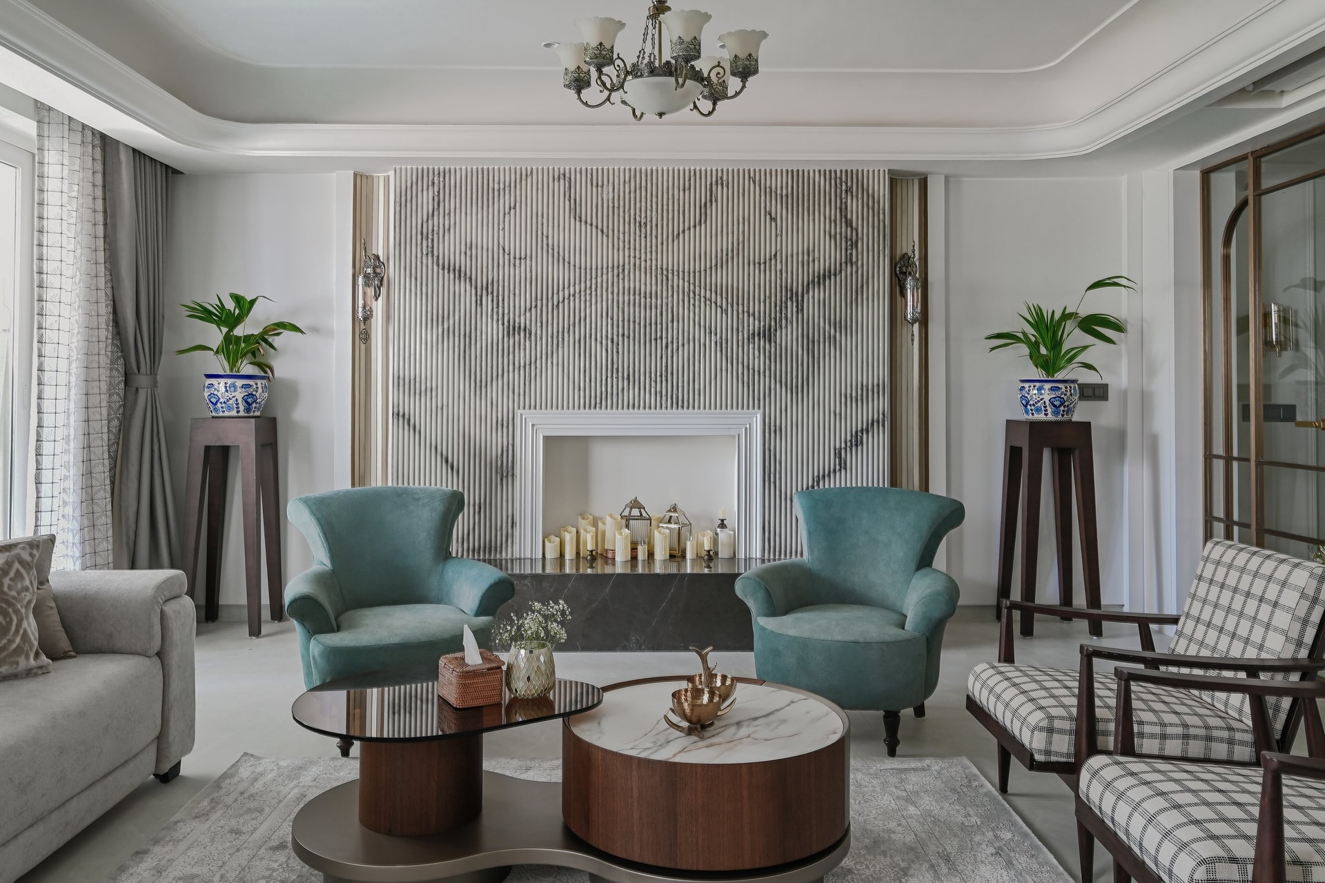 Seen from the opposite end, the seating arrangement holds the fireplace wall in calm symmetry