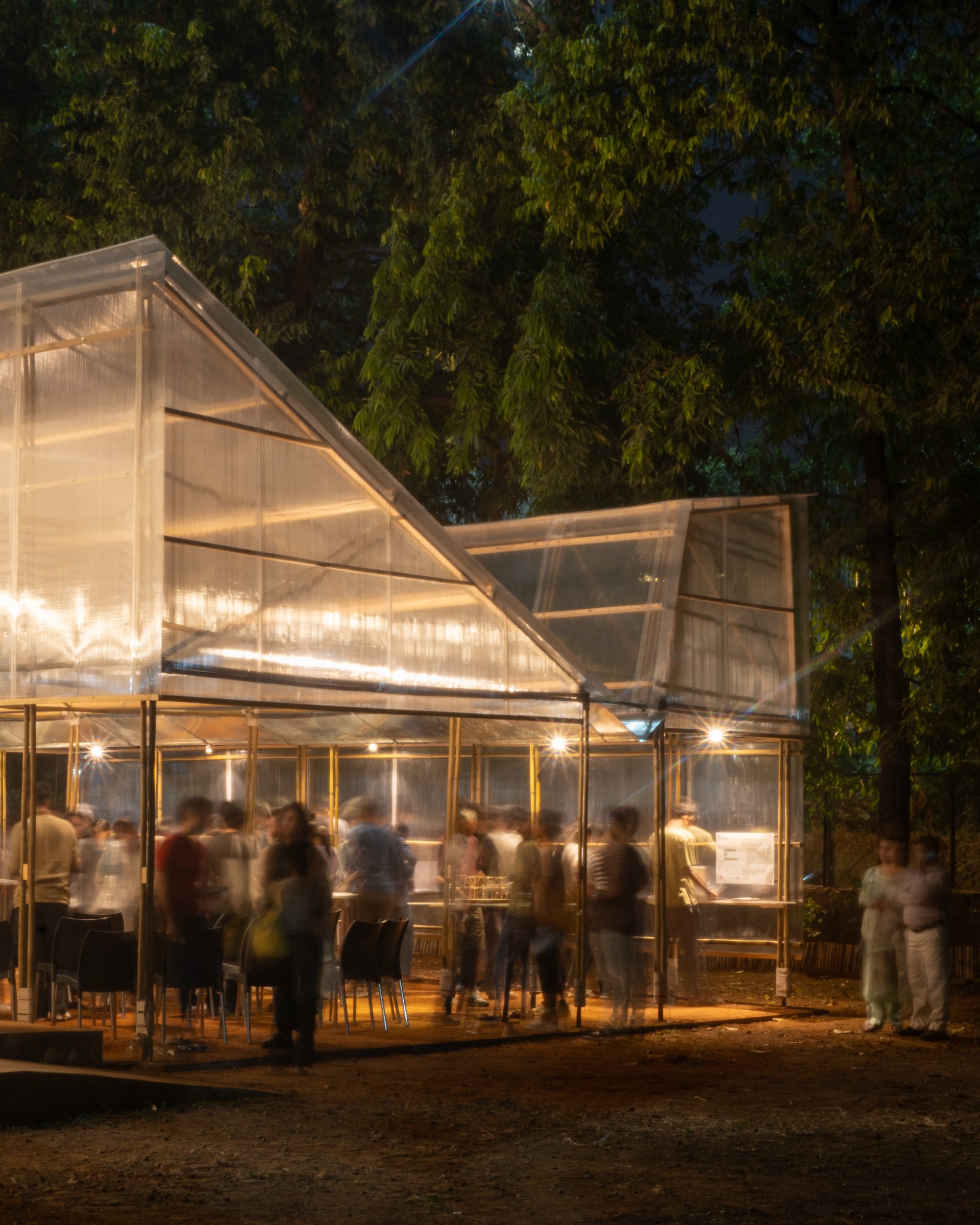 The longer elevation, where the inverted roof and golden-ratio proportions resolve into a clear architectural reading