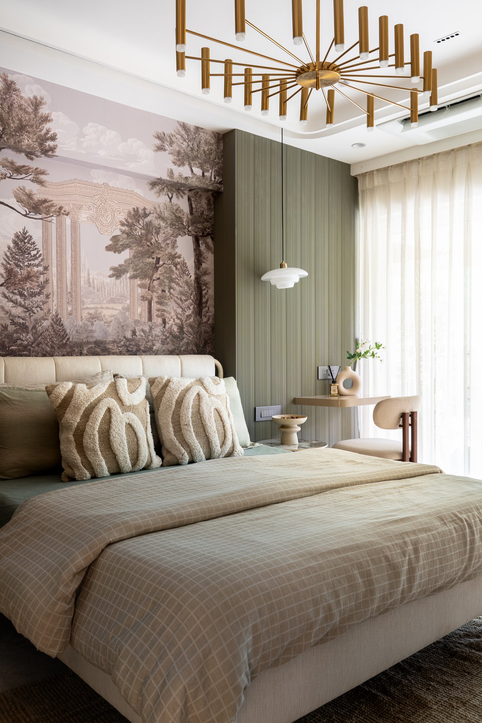 The guest bedroom, where a sepia-toned classical mural meets fluted sage panelling as the room's hero gesture