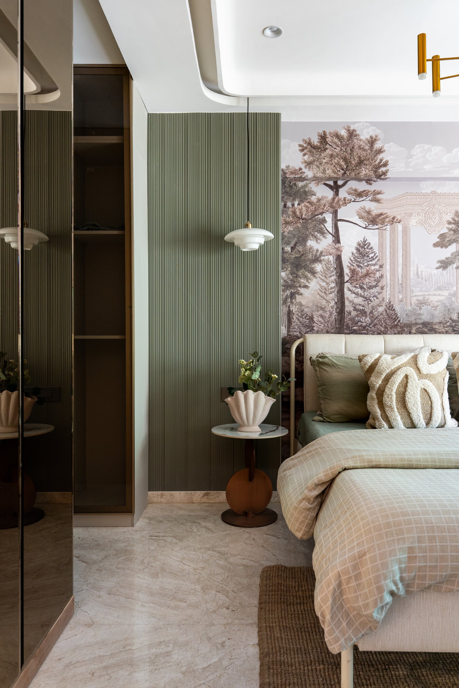 A closer view, where a marble-topped side table and a sculptural shell vessel balance pictorial drama with restraint