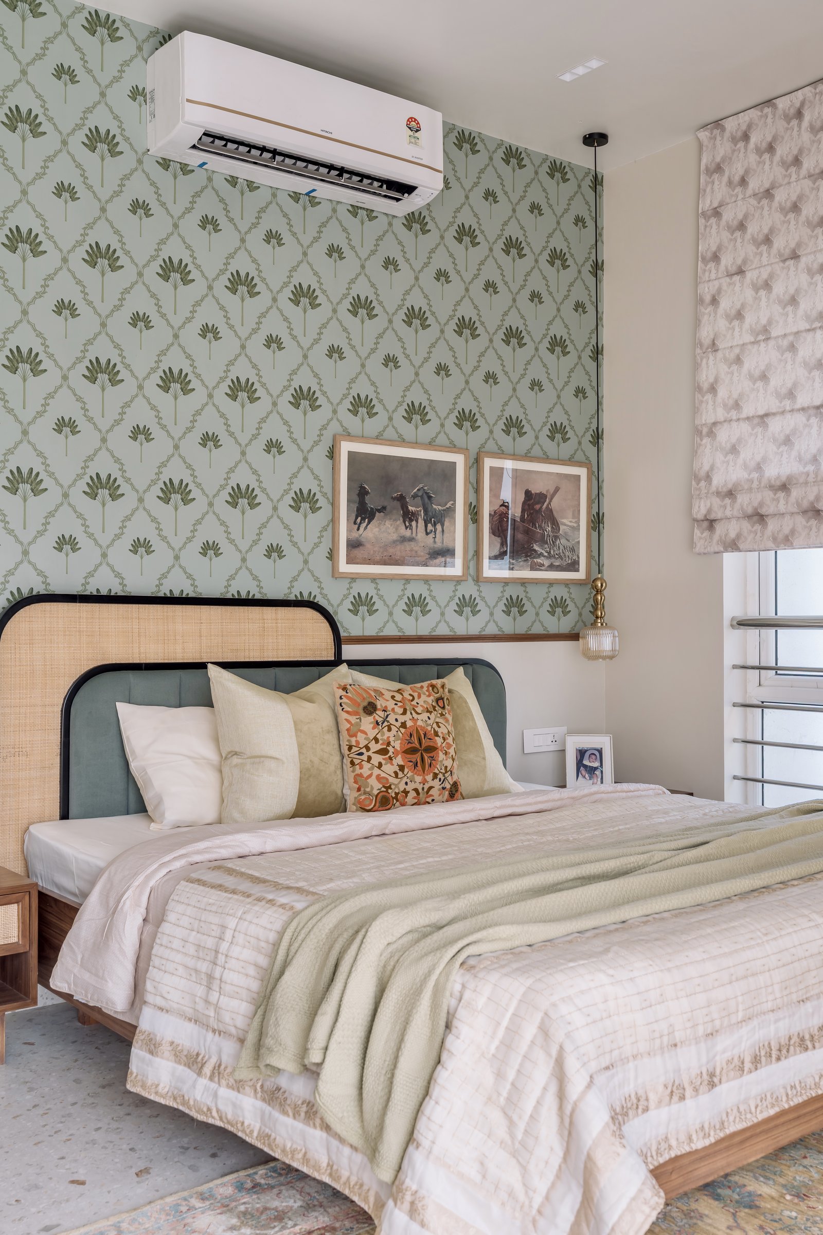 The master bed, a single composition of wood, cane, upholstery, and brass