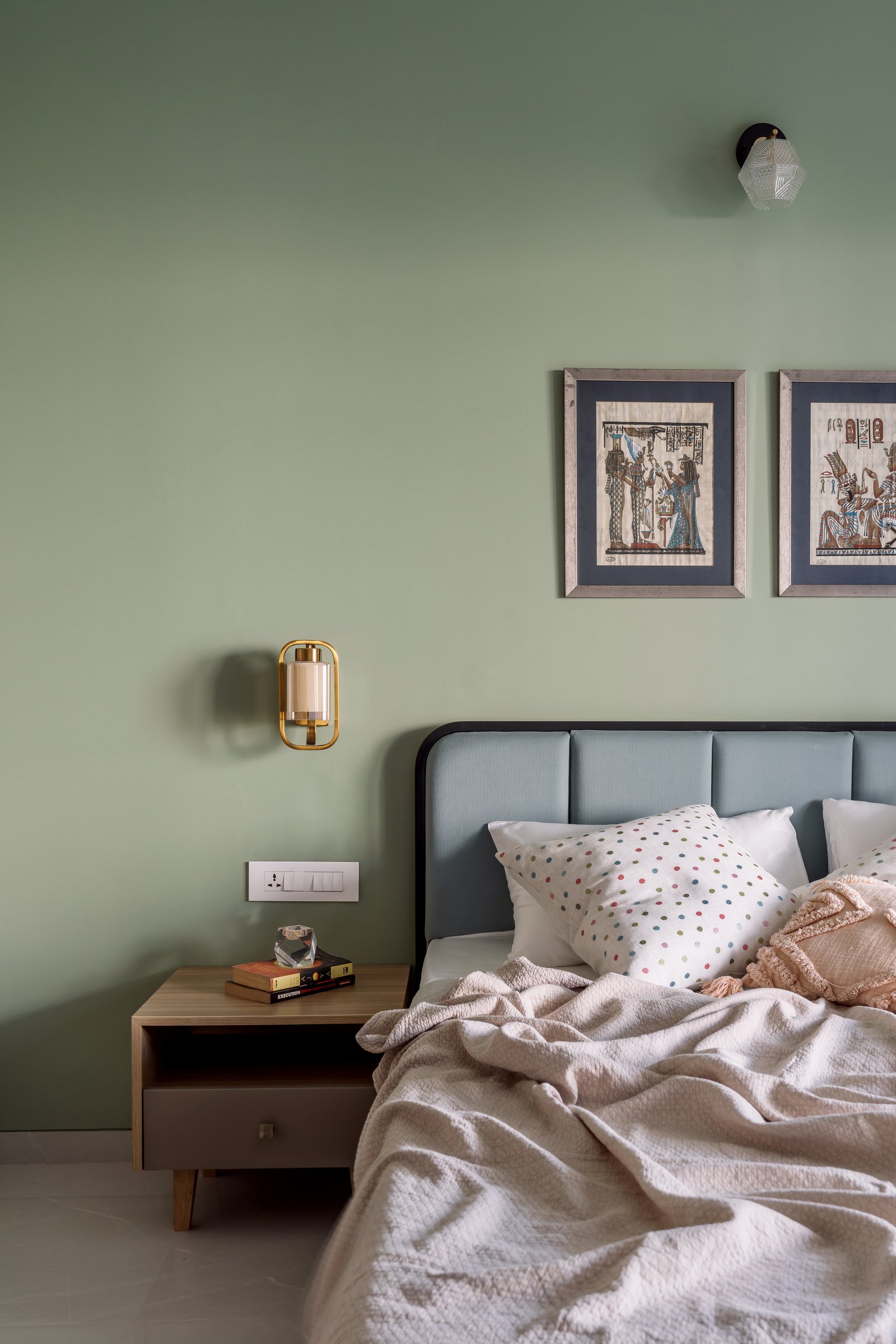 A closer view of the second bedroom, where styling withholds in favour of colour and proportion
