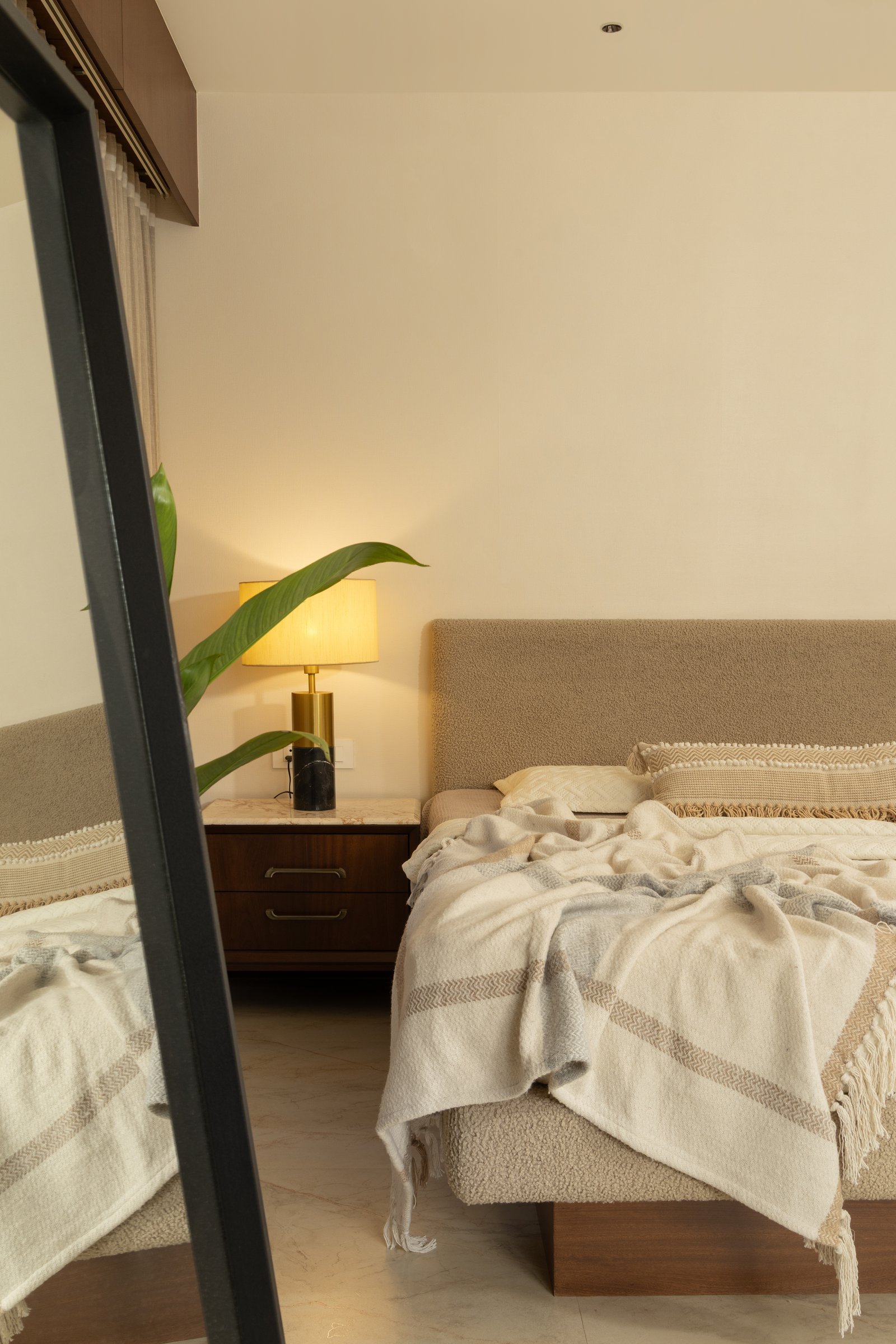 The third bedroom in lamplight, a corner of unhurried domesticity