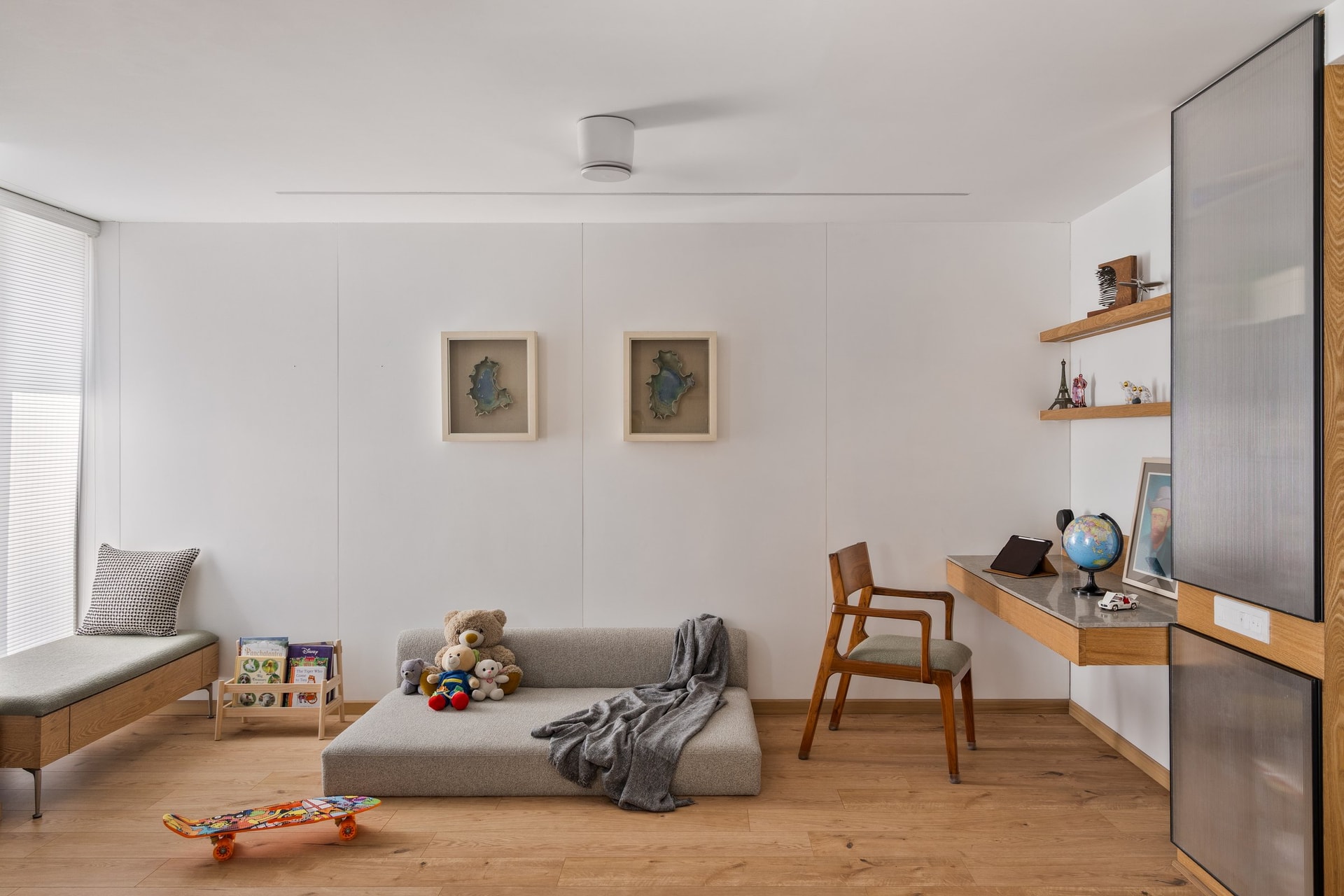The multi-use room, calibrated for reading, study, and play within a single restrained envelope