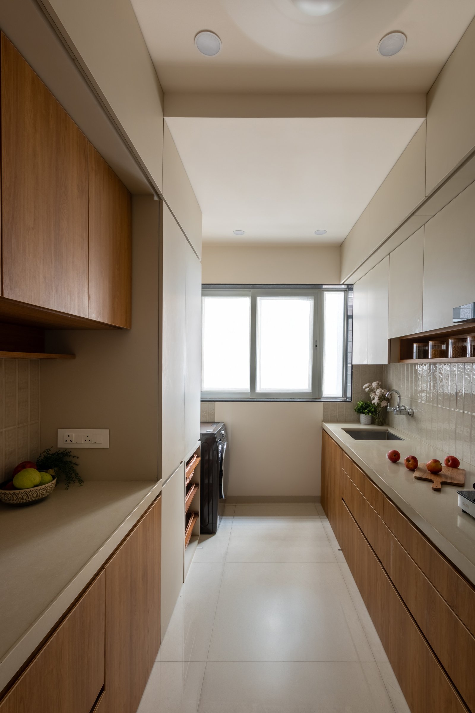 The utility spine behind the kitchen extends the same discipline into a workaday zone