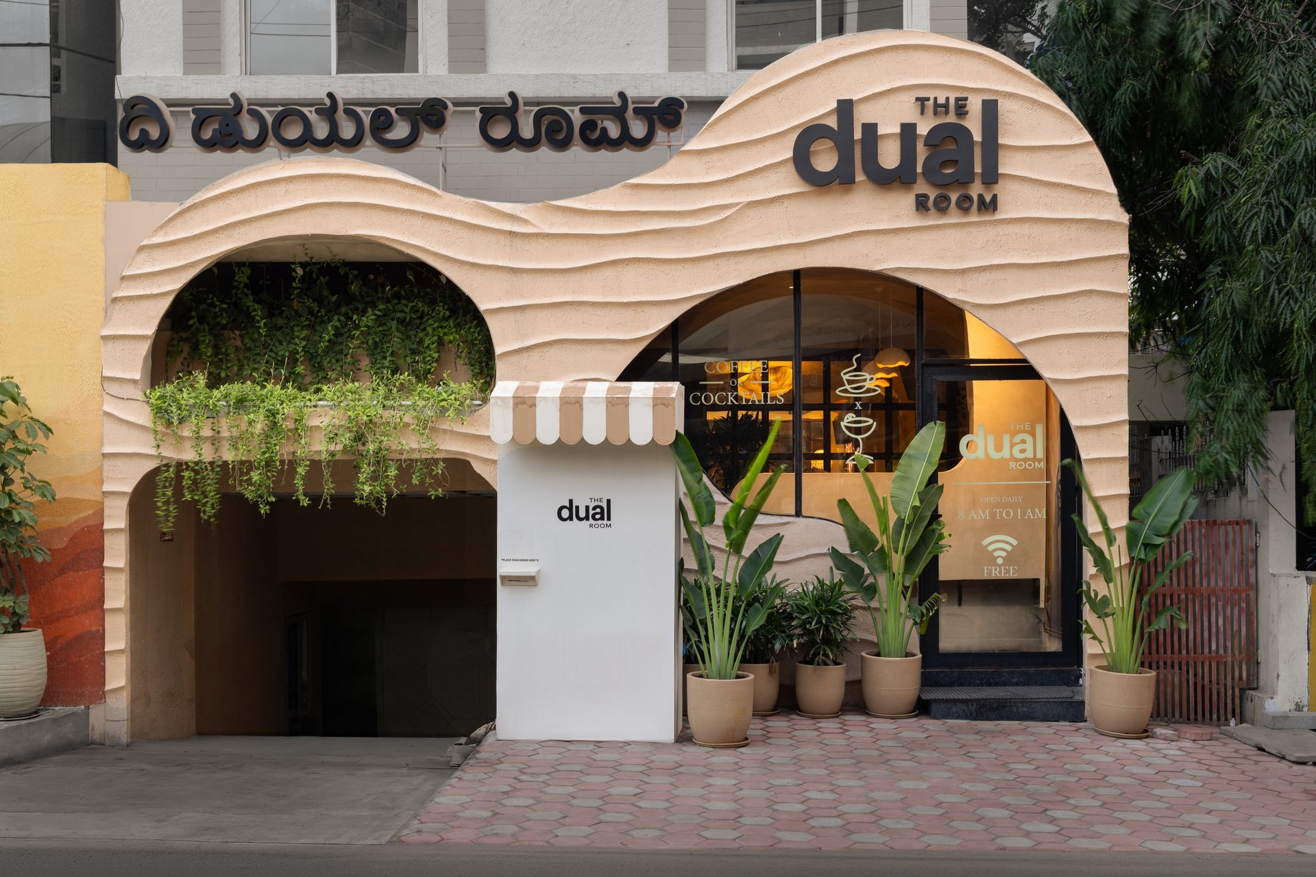 The sculptural façade on the street, its wave-like ridges previewing the design language within