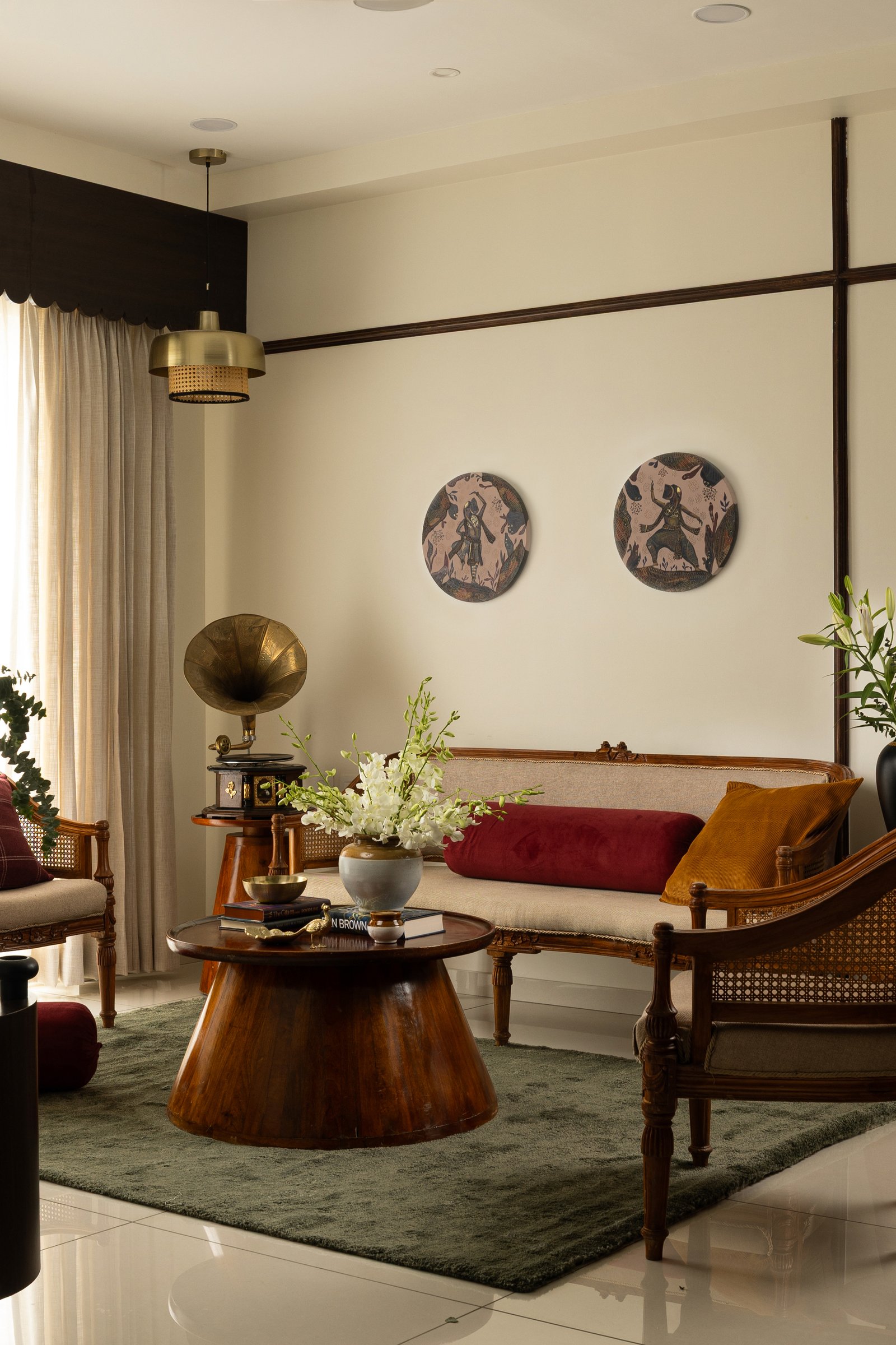 The settee and gramophone corner, a composition that gives the room its sense of collected time