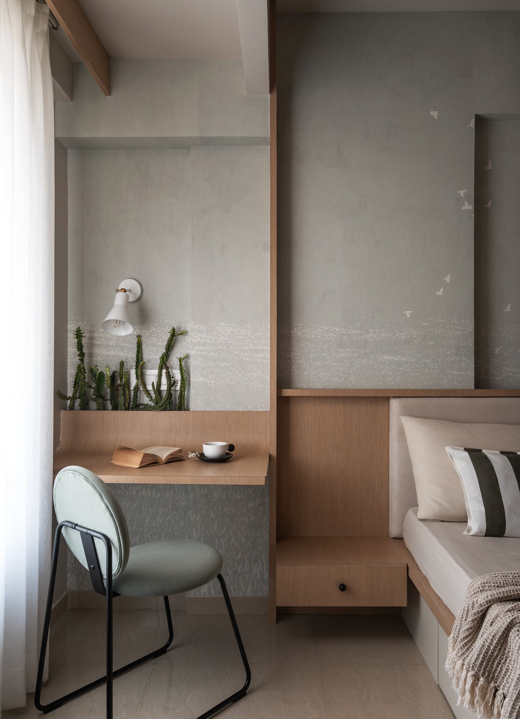 The cantilevered desk corner, functionally a workspace but composed as a still life