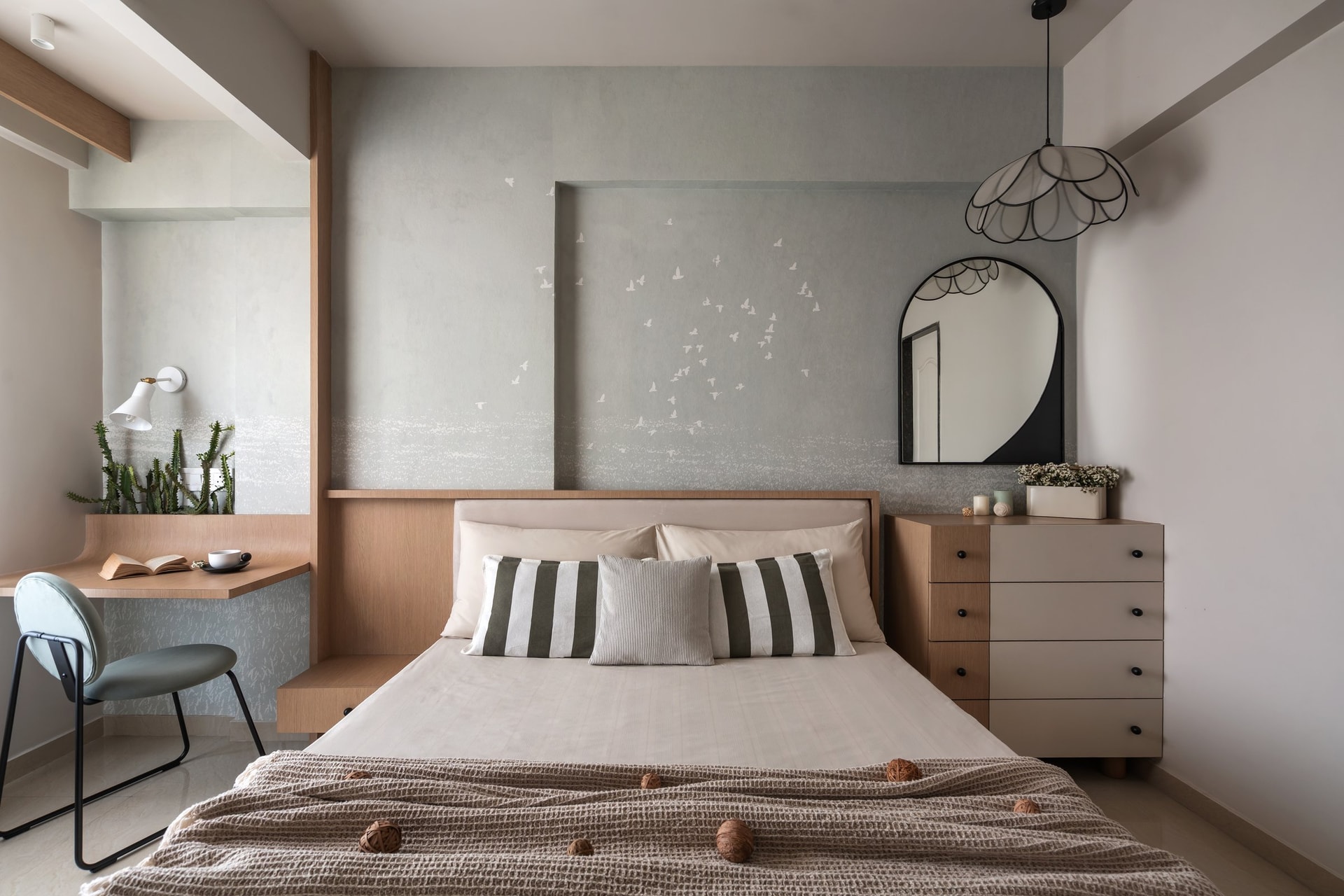 The bedroom, where a delicate flying-bird motif echoes the mangrove views beyond