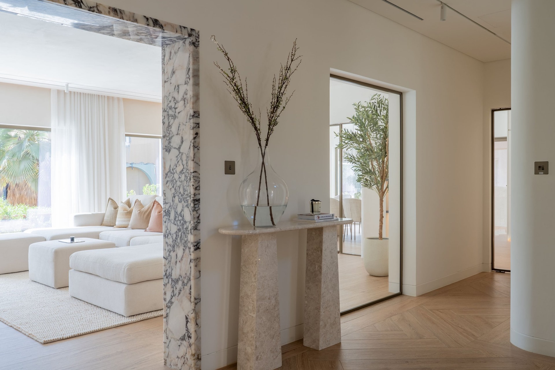 Lisa Christian, founder of The Design Edit, photographed in a softly lit interior that reflects the studio’s commitment to restraint and material warmth