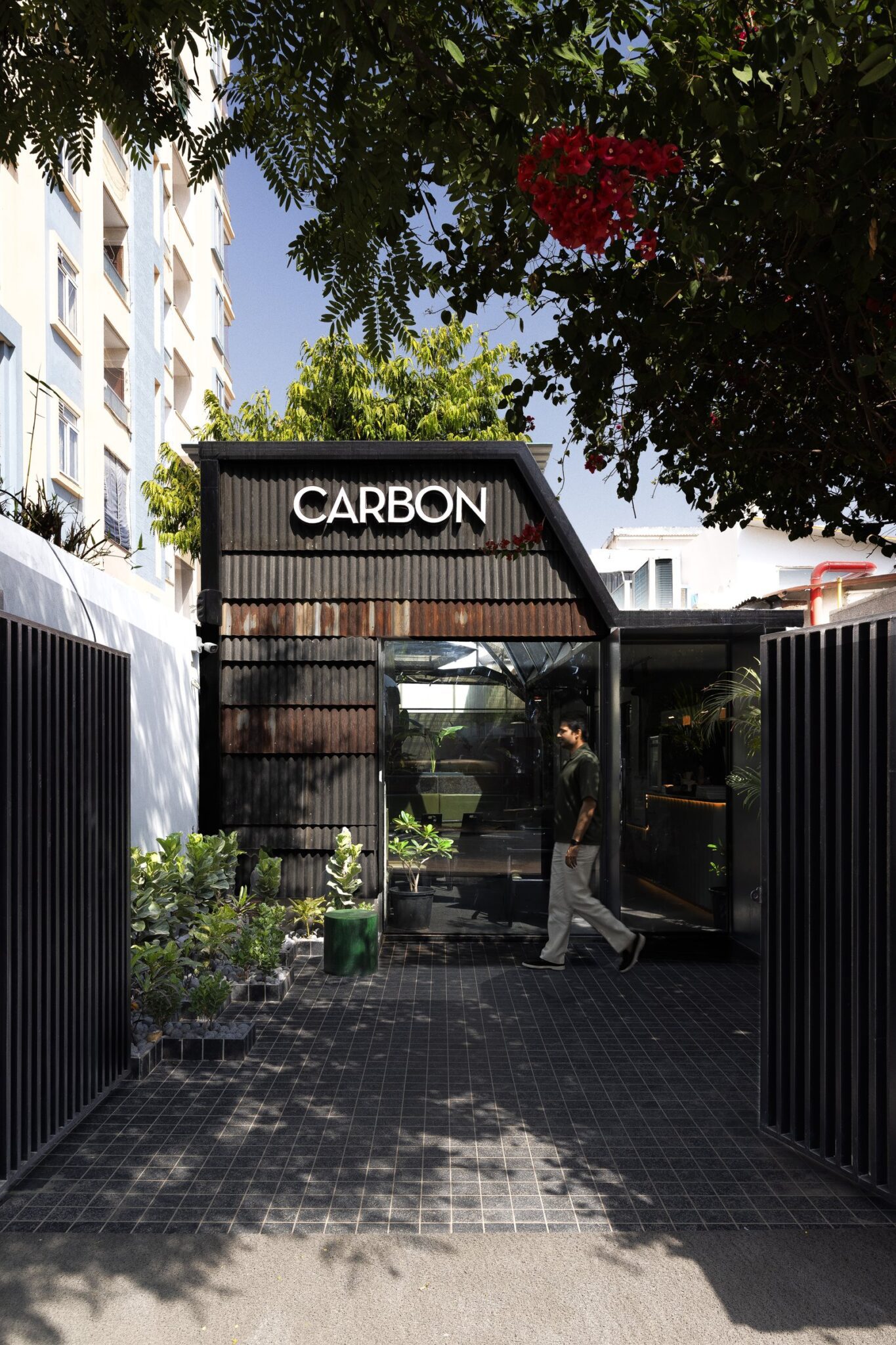Carbon Coffee: A Monochromatic Café Rooted in Material Expression — Newness Architecture, Jaipur