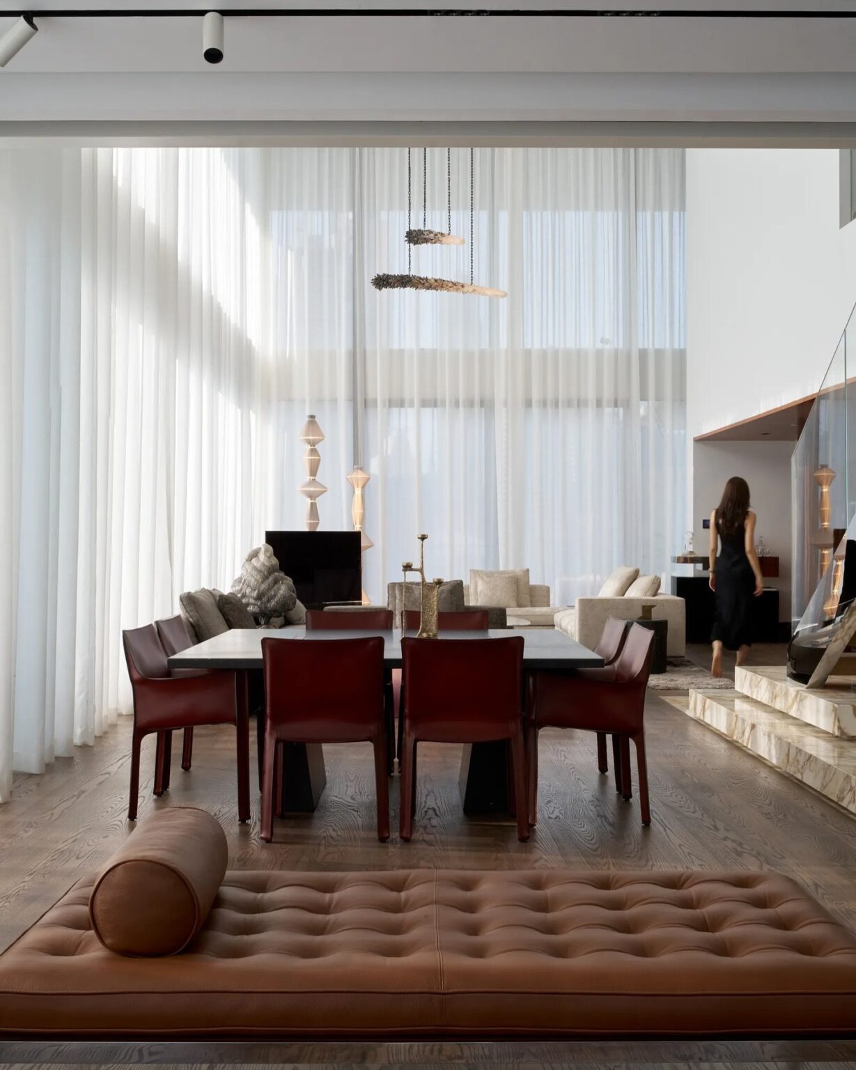 A Quiet Order: ANARCHITECT Shapes a Duplex at Lana Residences
