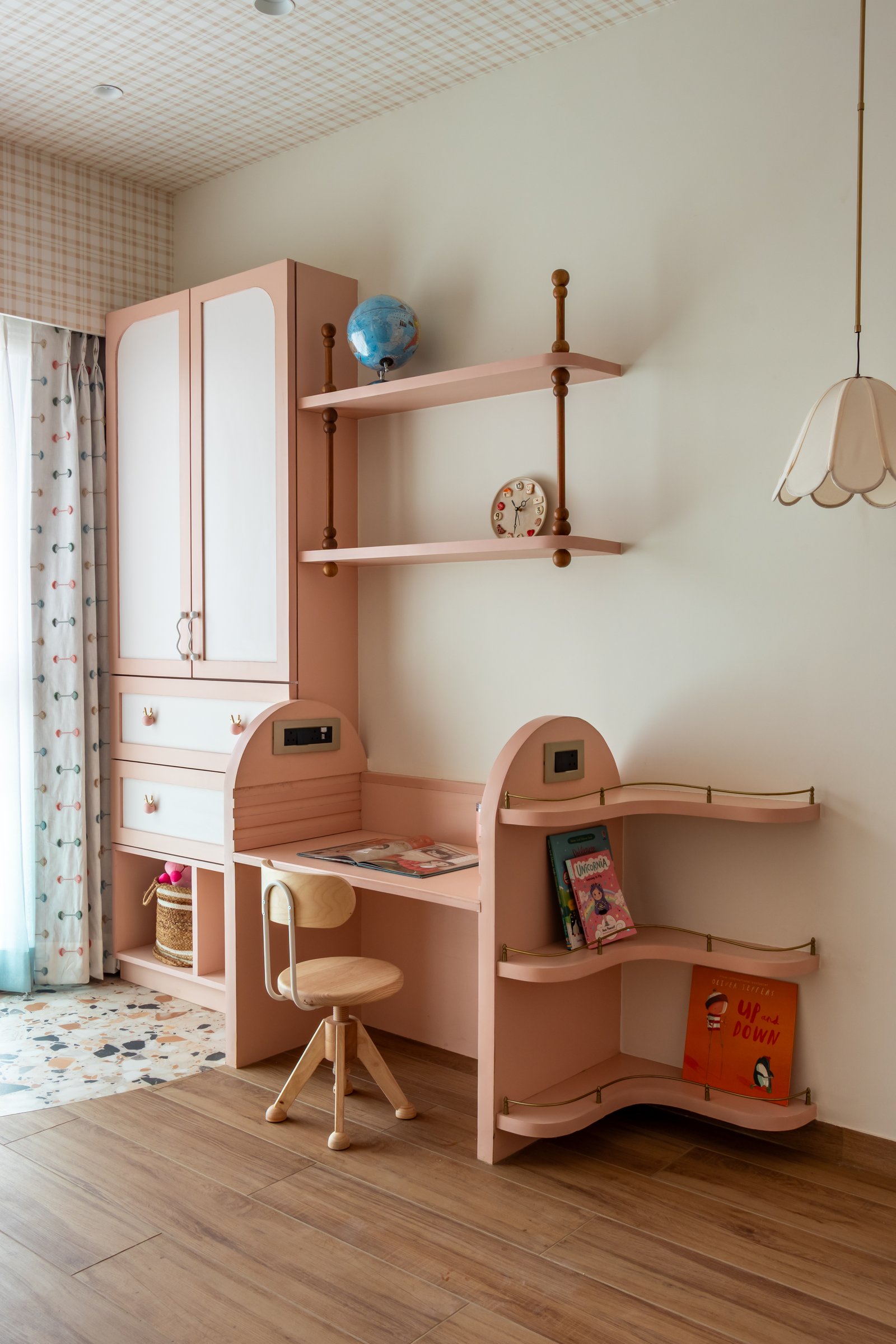 The study nook, composed as a small architectural set-piece within the children's room