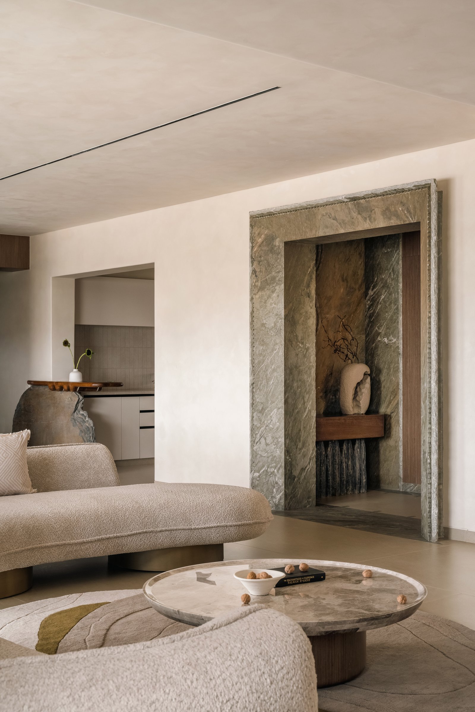 Looking back toward the foyer through the second marine-green marble portal