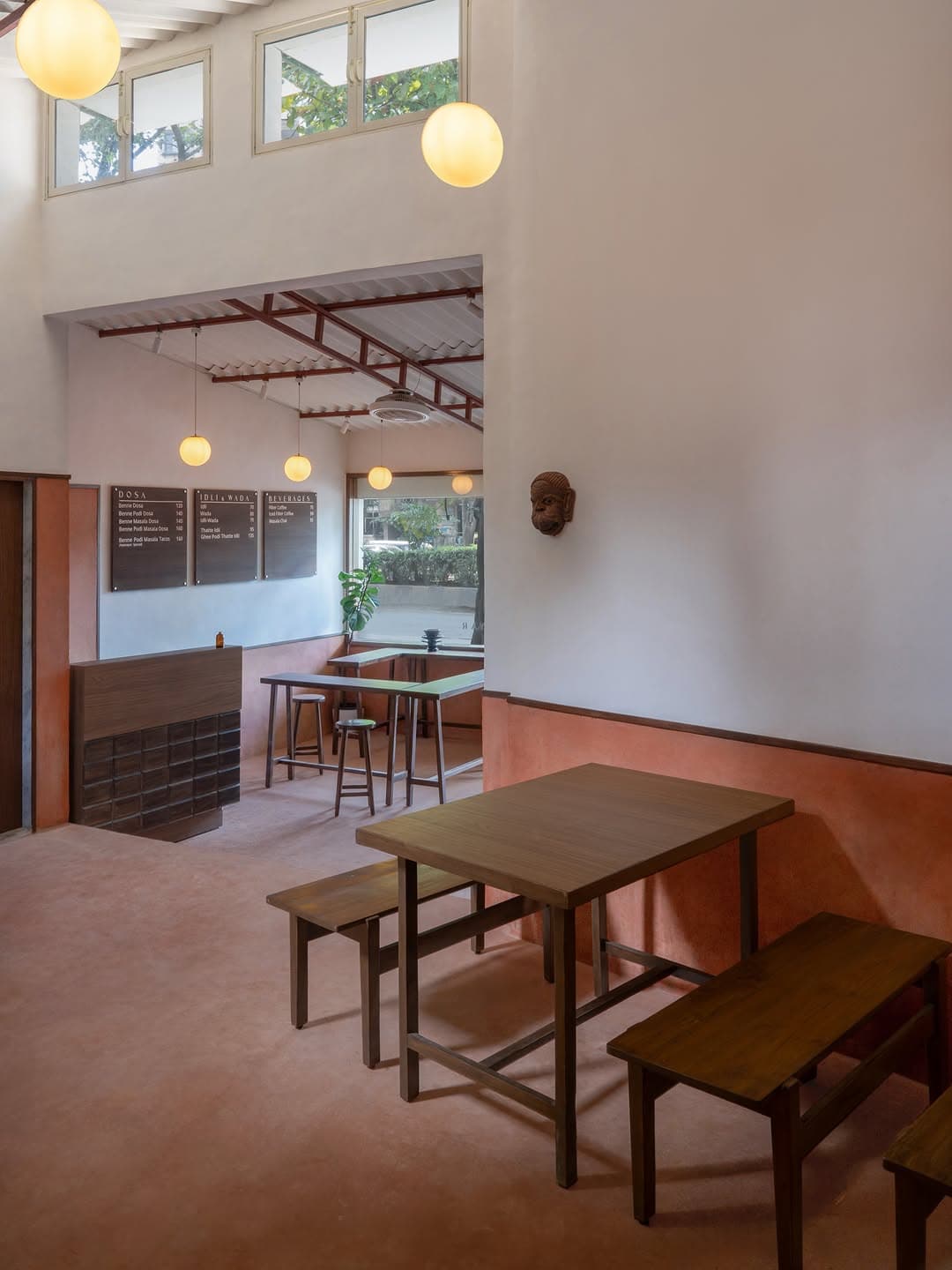 Designed by @rustcollective_ , Anjaneyar transforms an existing godown in Chembur, Mumbai, into a neighbourhood café tha…
